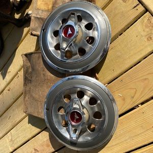 1965 Buick skylark hubcaps with wings down